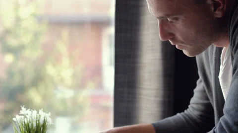 Close up of a man writing something in a notebook Stock Footage 65376120
