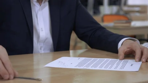 Close up manager writing signature Stock Footage 112084748
