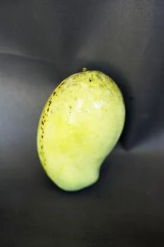 Close up of mango on a black background Stock Photos