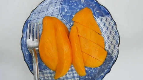 Close up mango fruit on blue plate. Stock Footage 128669327