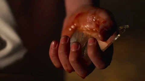 Close-up of maniac holding mirror chip in bloody hand, person committing suicide 스톡 동영상 59084262