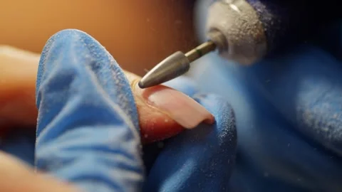 Close-up of a manicure machine working while removing gel polish. Stock Footage 343540938