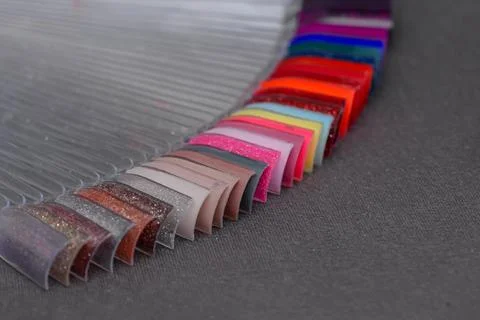 Close-up manicure process, female hands painting nails Stock Photos