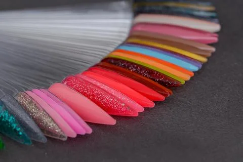 Close-up manicure process, female hands painting nails Stock Photos