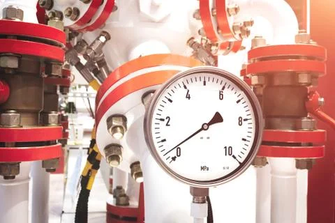 Close up of manometer, pipe, flow meter, water pumps and valves of heating sy Foto stock