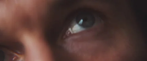 Close up of a man's blue eye staring upwards Stock Footage 202249171
