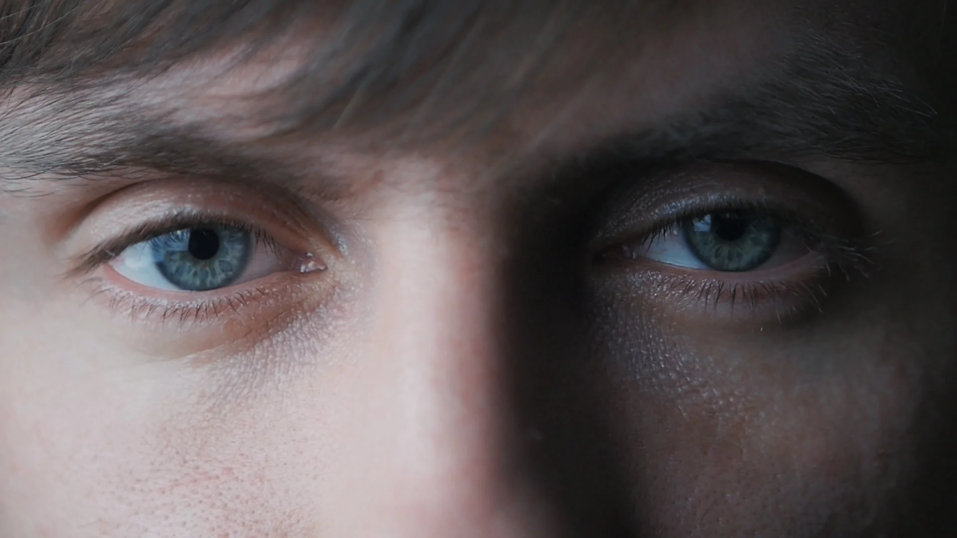 Close-up Shot Of Man's Eye. Man With Blue Eyes. Stock Photo