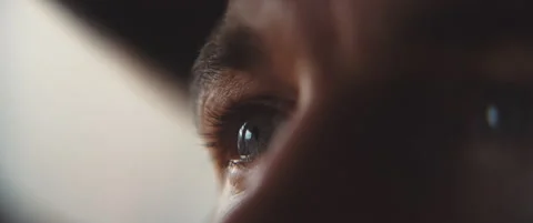Close Up of a man's eye wearing a hat Stock Footage 202249040