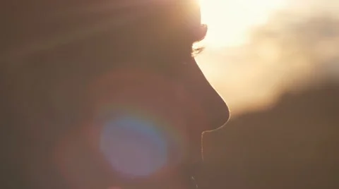 Close-up of man's eyes looking at the sun Stock Footage