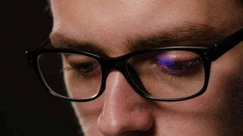 Close-up of a Man's Face Against a Black Background Stock Footage 88453266