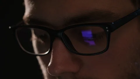 Close-up of a Man's Face Against a Black Background Stock Footage 88453324