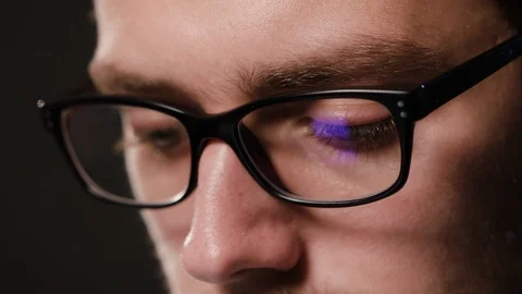 Close-up of a Man's Face Against a Black Background Stock Footage 88453343