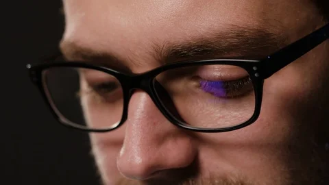Close-up of a Man's Face Against a Black Background Stock Footage 88453404