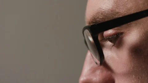Close-up of a Man's Face Against a Black Background Stock Footage 88453689