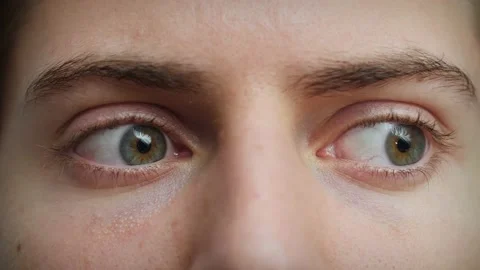 Close up of Man's face. Attractive boy looking around with beautiful blue eyes. Stock Footage 142908466