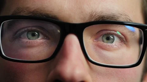 Close up of man's face with glasses. Boy opening his beautiful blue eyes. Stock Footage 165207805