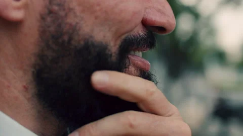 Close-up of a man's face, portrait of an elderly man with a beard, close-up of Stock-Footage 166109354