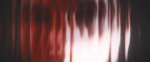 Close up of mans face viewed through shaped glass panel Stock Footage 203565273