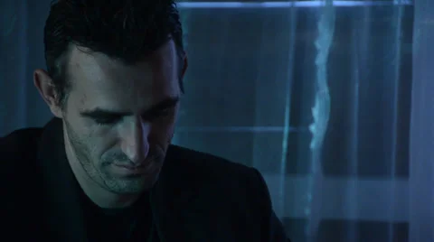 Close up of a mans face while writing Stock Footage 34293872