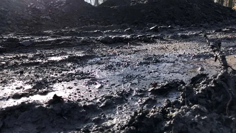 Close-up of man's feet running in the mud. Stock Footage 82681289