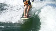 Close Up Of Man's Feet While Wake Surfing Stock Footage