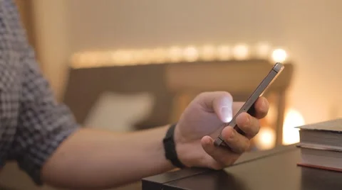 Close-up of a man's hand and a mobile phone Video stock 59908787