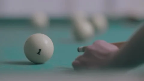 Close up of a man's hand with a billiard cue hitting the ball Stock Footage 155926352