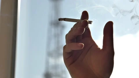 Close-up of a man's hand with a cigarette. Bad habits, smoking during stress. Stock Footage 204937618