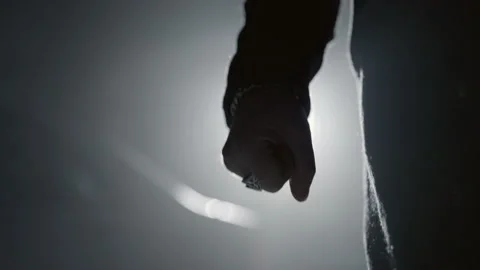 Close-Up Of A Man'S Hand Clenching And Unclenching Has He Walks At Night - Видео 188057079
