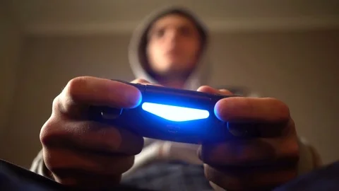 Close-up man's hand with controller, game pad Stock Footage