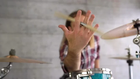 Close Up of Mans hand doing stick trick. Drummer is doing rehearsing Stock Footage 155554156