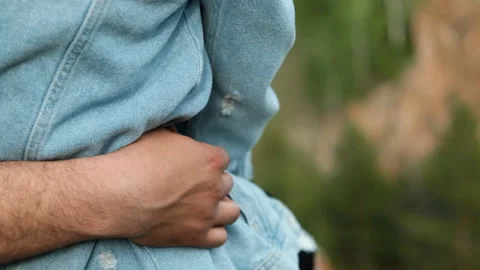 Close-up of a man's hand embracing his girlfriend. Stock Footage 111092704