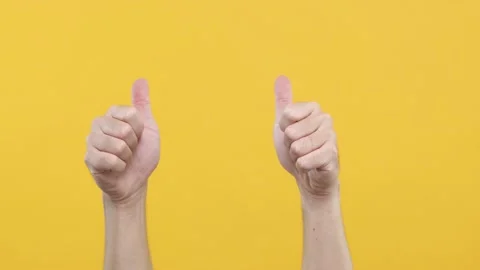 Close up of Man’s hand gestures. Approval like. Man showing thumb up isolated on Stock Footage 144668589