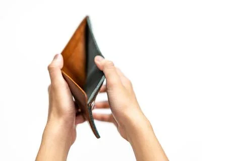 Close up of man's hand holding empty wallet. Stock Photos