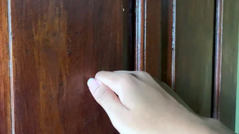 Close up of a man's hand knocking on the door Stock Footage 306291633