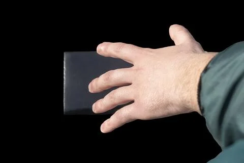 Close-up of a man's hand, loss of documents White background. Close-up. There Stock Photos