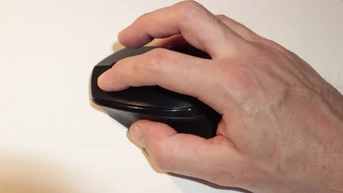 Close-up, man's hand moves the mouse working on the computer Stock Footage 130864301