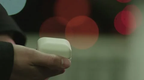 Close up of man's hand opening ring box during Christmas season Stock Footage 59457384