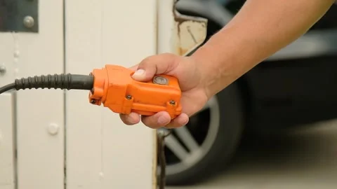 Close-Up of Man's Hand Operating Industrial Elevator Remote Stock Footage 254883370