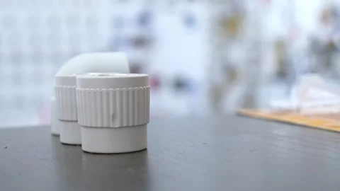 Close-up. a man's hand picks up a plumbing fixture, in a bag in a store Video stock 139639746