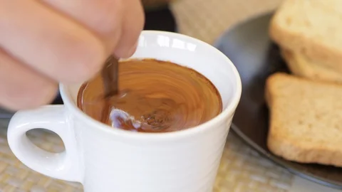 Close up of man's hand that prepares a cup of coffee Stock Footage 128462666