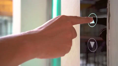 Close-up of the man's hand pressing the button to call the Elevator. Stock Footage 155491240
