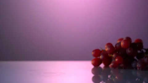 Close-up man's hand put down the red wine glass. 4k video of hand with red wine Stock Footage 151512898