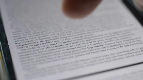 Close-up man's hand reading e-book on the kindle. kindle ebook reader 스톡 동영상 204780102