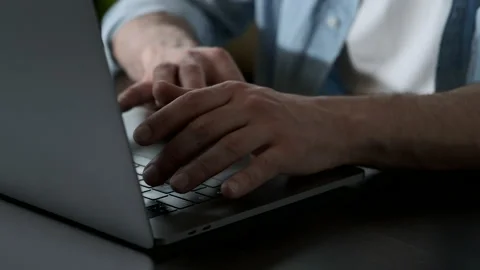 Close-Up of a Man's Hand Typing on a Computer Keyboard, Remote Online Mode Stock Footage 143478754