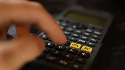 Close-up man's hand using calculator for financial business. Video stock 209258959