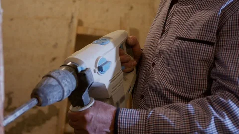 Close up of the mans hand using cement mixer Stock Footage 125628131