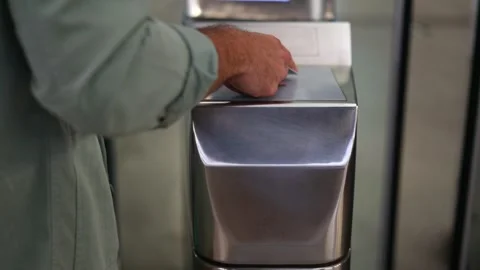 Close-up of man's hand using contactless card at metro turnstile, 4k video Stock Footage 298562135
