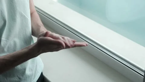 Close-up with man's hand using hand cream to care about skin. Stock Footage 172091200