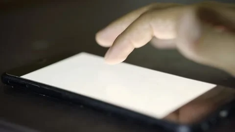 Close up of a man's hand using his cell phone Stock Footage 272254586